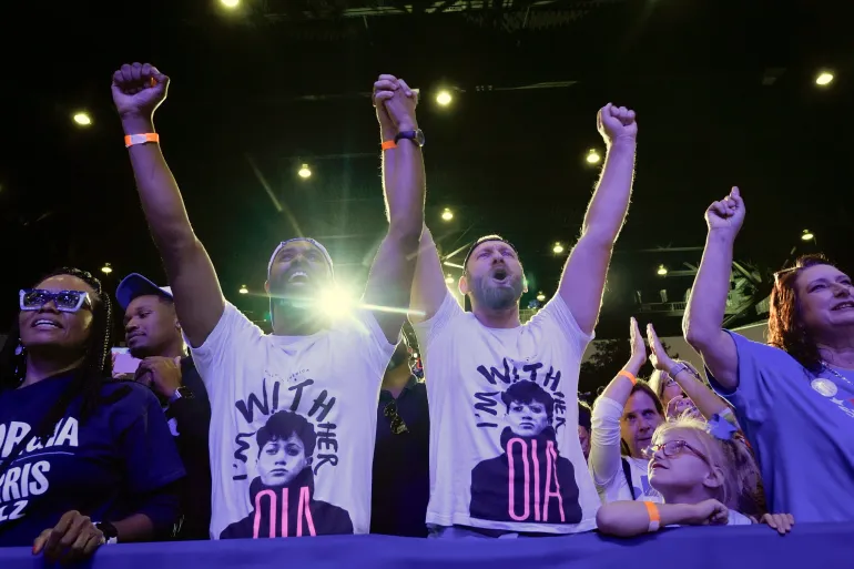 Supporters cheer at a rally for Donald Trump