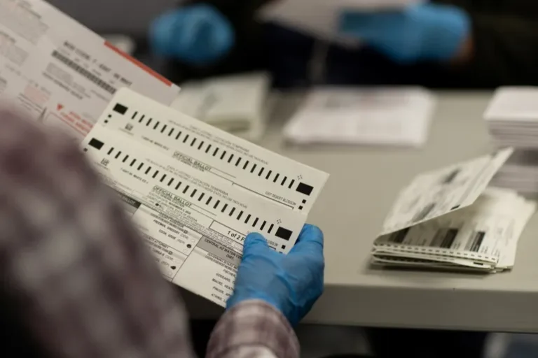 Election workers process ballots for the 2024 election at the Maricopa County Tabulation and Election Center in Phoenix, Arizona, on November 5