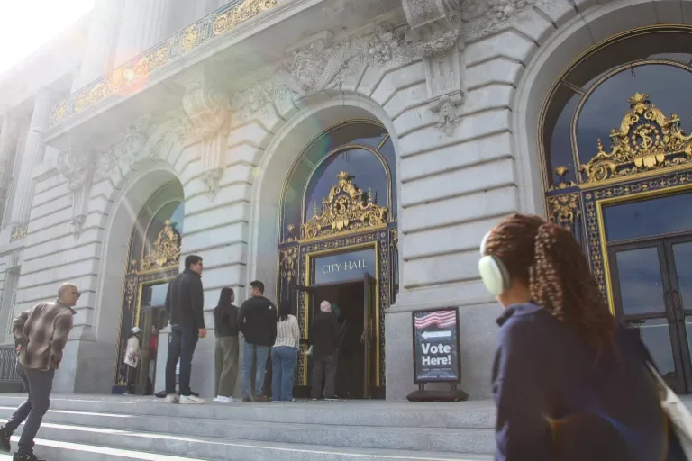 Voters line up at San Francisco's City Hall to cast their ballots on November 5